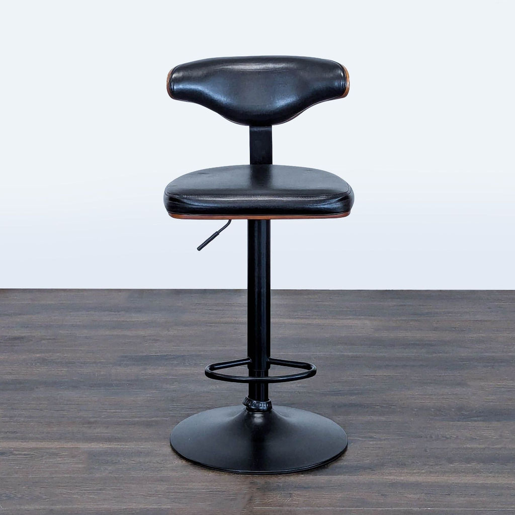 Height-adjustable stool with footrest from Ashley Furniture, ideal for kitchens or bars.  