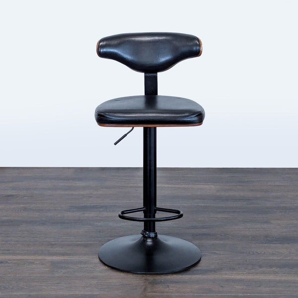 Height-adjustable stool with footrest from Ashley Furniture, ideal for kitchens or bars.  