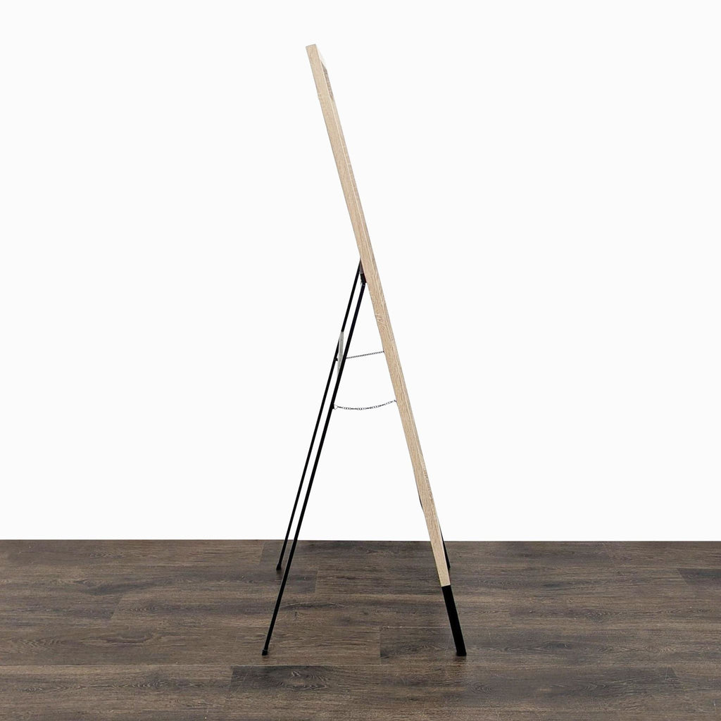 Standing full mirror with wooden frame and foldable stand, MCS Industries brand.