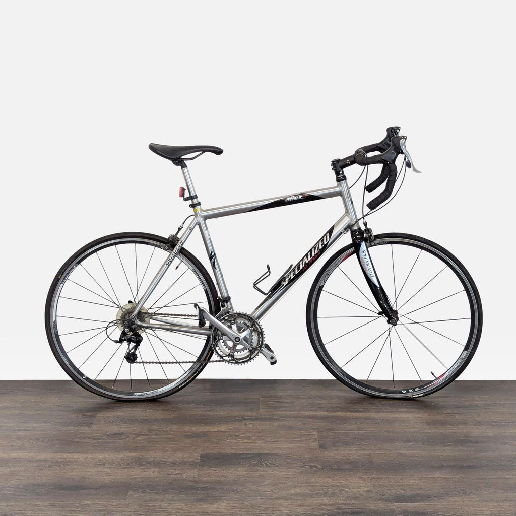 Specialized Allez Elite road bike with lightweight aluminum frame and drop handlebars, ideal for training.