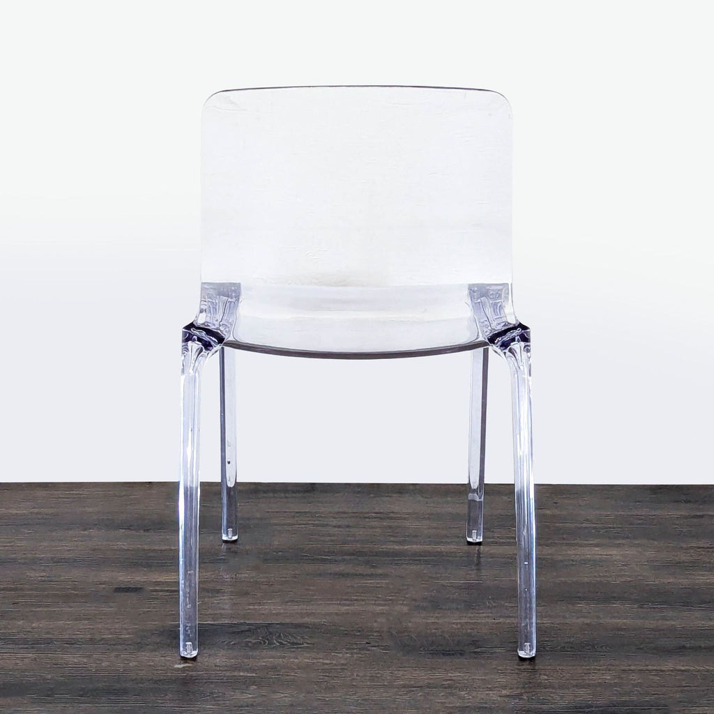Clear acrylic and metal dining chair by LeisureMod, modern design with sleek lines.