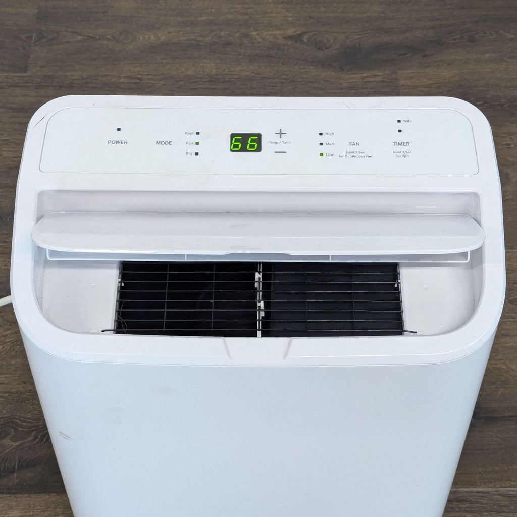 Compact GE air conditioner with easy digital panel, WiFi-ready functions, and multiple fan speeds for comfort.