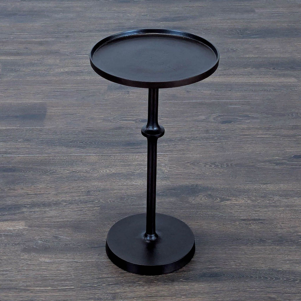 2. Arhaus console table featuring refined craftsmanship, ideal for displaying decor in stylish interiors.