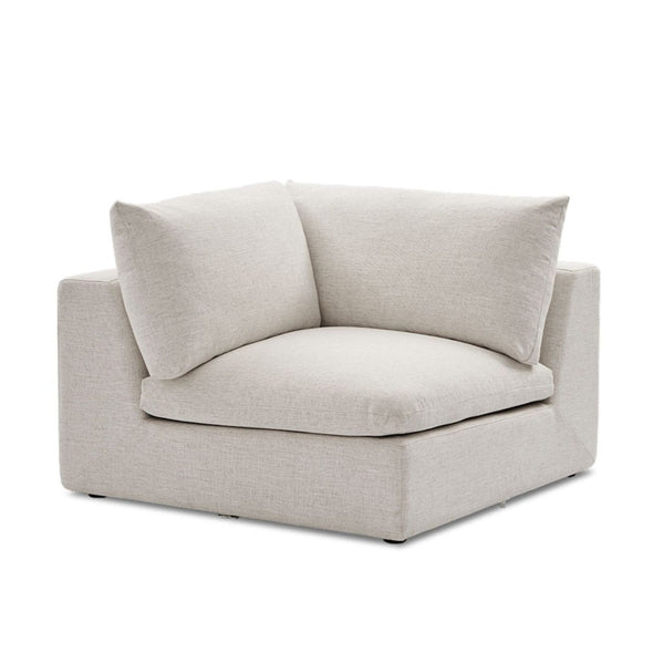Castlery sectional corner chair with wide, plush cushions in soft linen, perfect for a modern living room.