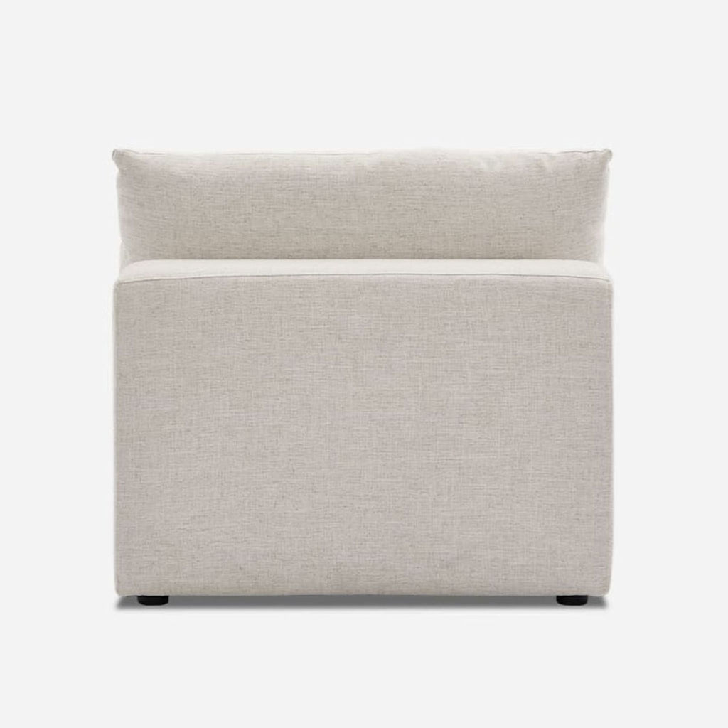 Plush, linen-upholstered Castlery sectional chair designed for comfort and versatile modular seating arrangements.