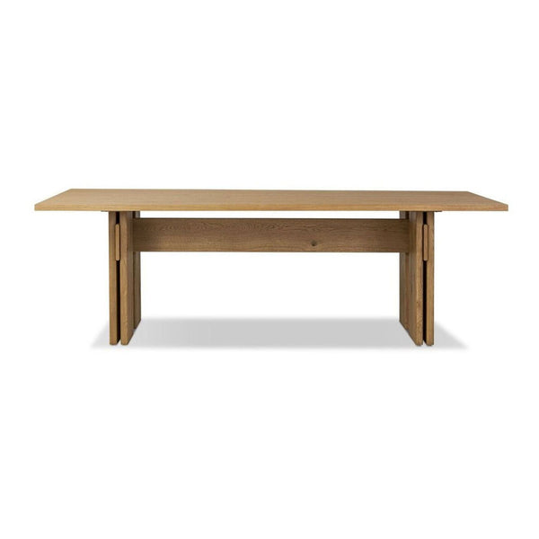 Rectangular light oak dining table with visible joints and a modern, design-forward look by Four Hands.  