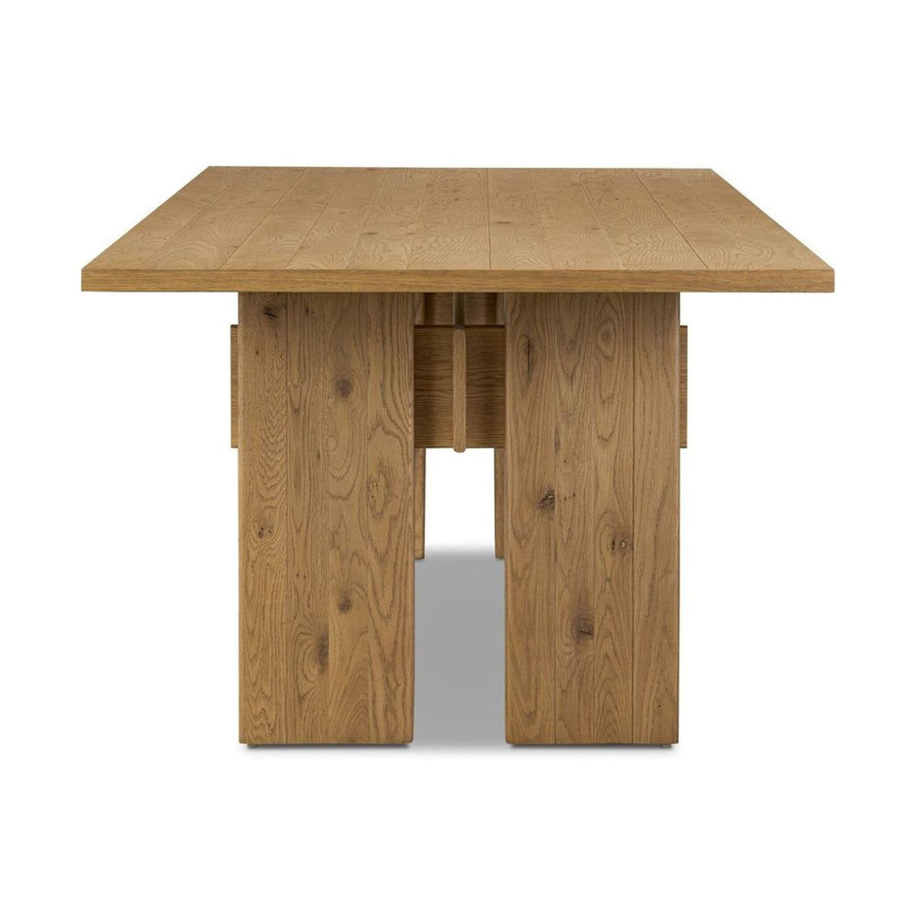Contemporary rectangular dining table in light oak veneer, featuring unique connections; Dining Table by Four Hands.