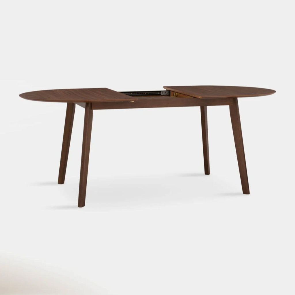 Contemporary oak and walnut veneer dining table by Hoft, shown with integrated butterfly extension partially open.  