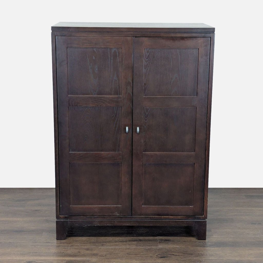 1. Ethan Allen dark wood cabinet with two paneled doors, simple metal knobs, and a clean, modern design.