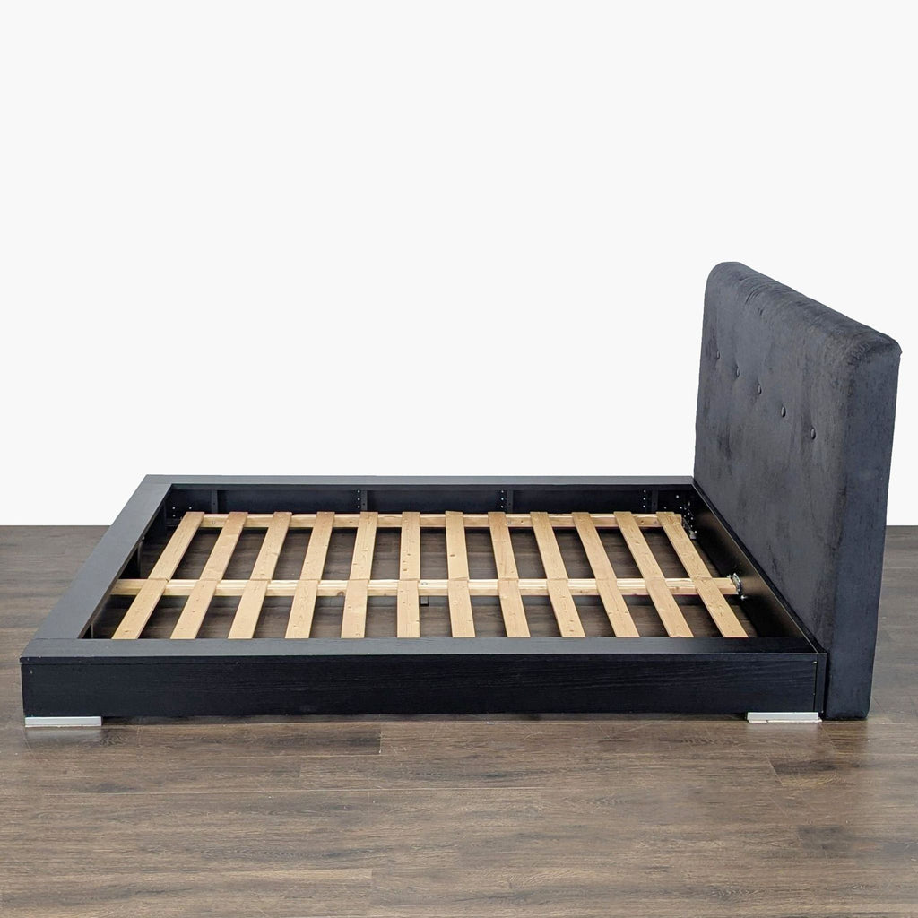 Sturdy BoConcept frame with wooden slats and contemporary headboard, perfect for a clean, minimalist bedroom look.