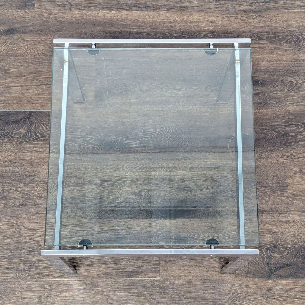 Contemporary end table featuring a compact design and smooth surface, ideal for small spaces.