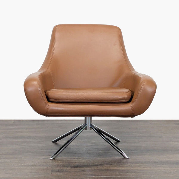 Brown leather lounge chair with wide seat and metal swivel base from Design Within Reach, modern style.