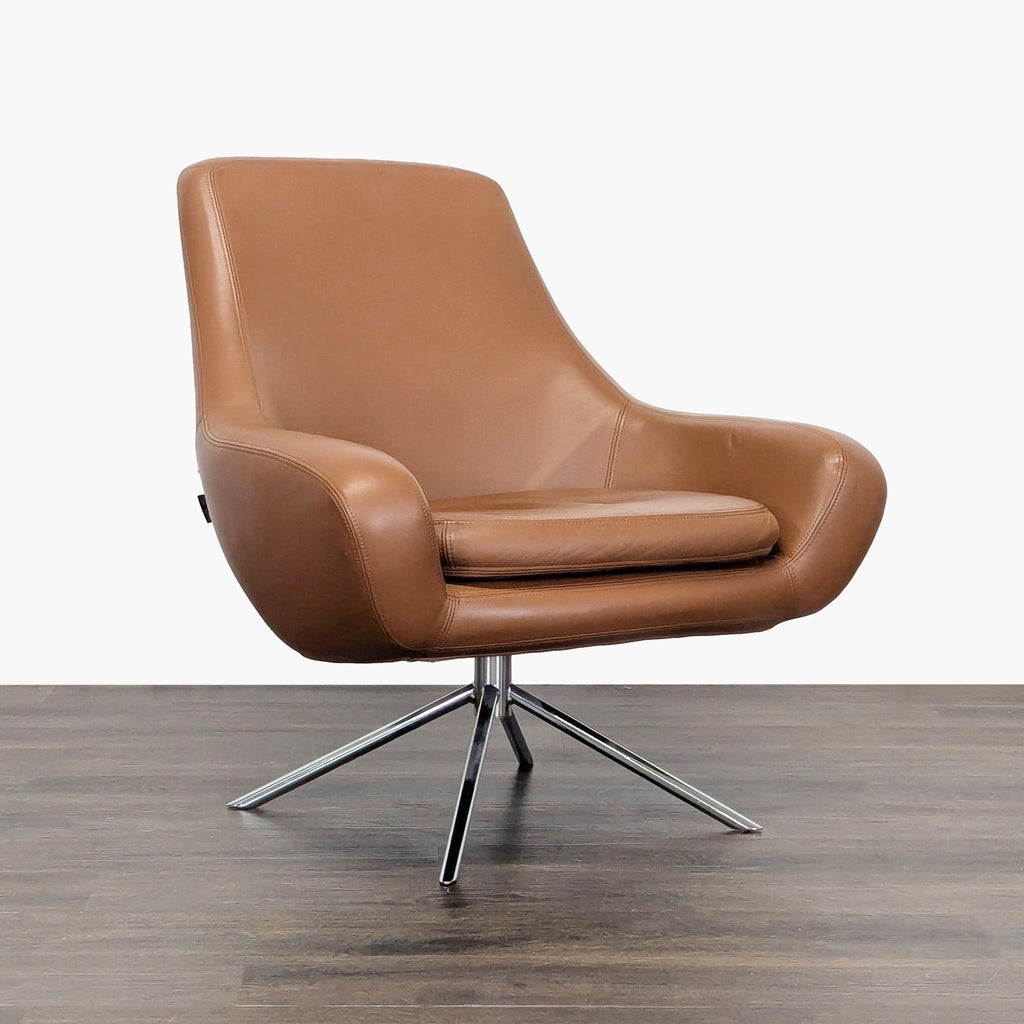 Modern Design Within Reach lounge chair in brown leather, featuring a comfortable seat and sleek metal base.
