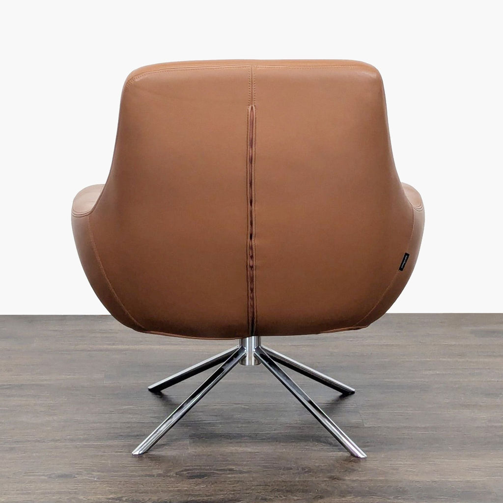 Stylish brown leather swivel lounge chair with wide seat, ideal for living rooms or offices, excellent condition.