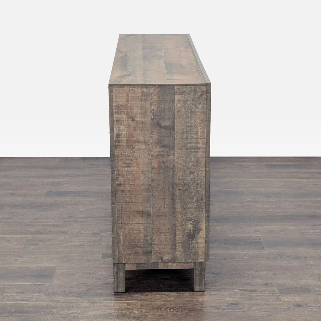 Six-drawer rustic dresser with clean lines and metal handles provides ample storage for clothes or decor.