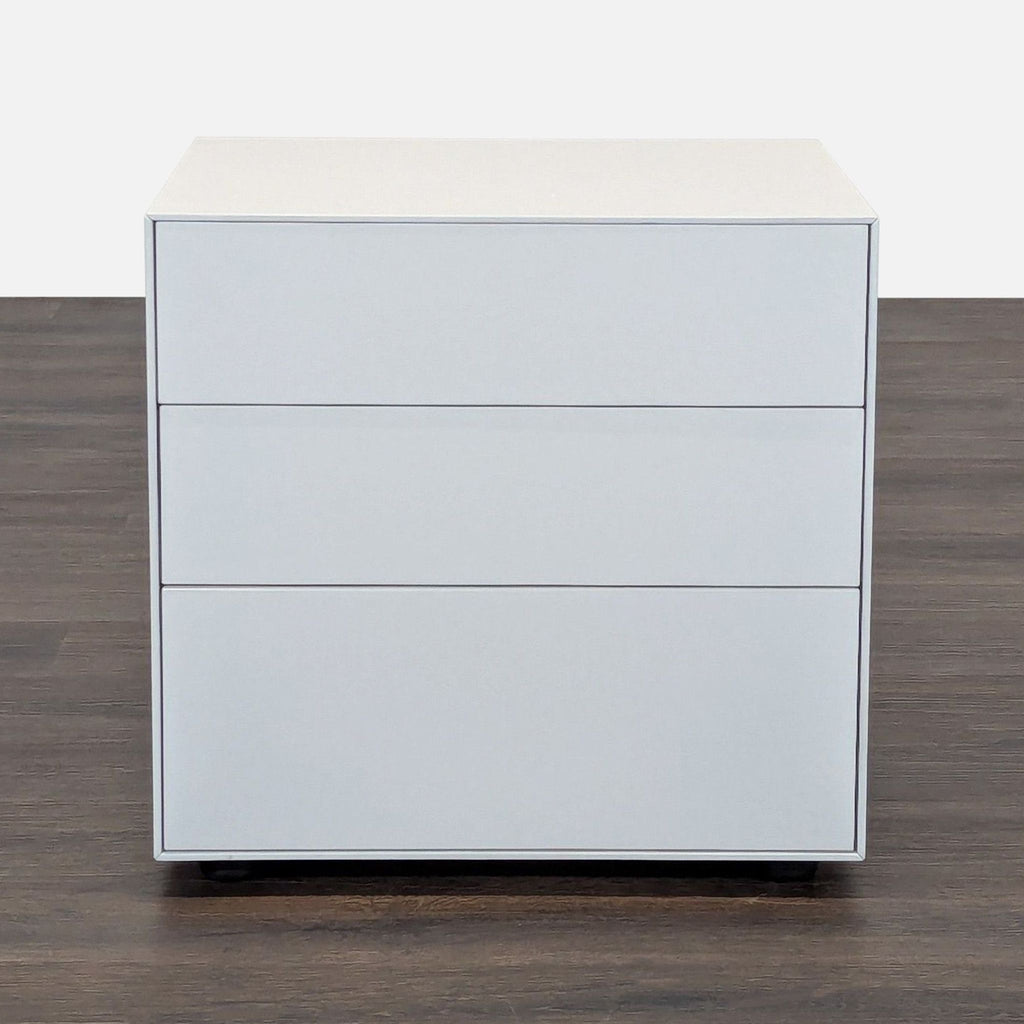 Sleek Spanish nightstand with three drawers, lacquered MDF in modern finish, designed by Ibon Arrizabalaga.