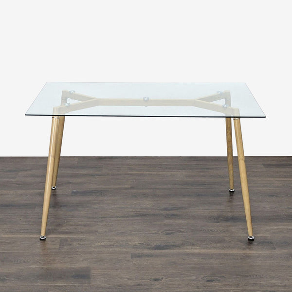 1. Rectangular glass dining table with wooden legs and metal supports, placed on a dark wood floor.