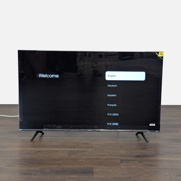 Hisense 40-inch LED TV in excellent condition with stand, screen on and display menu visible, remote not included.  