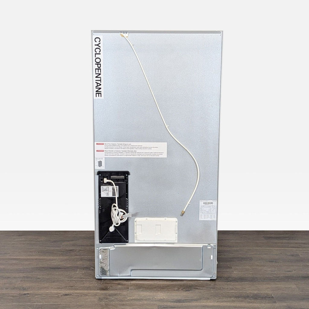 Sleek Bosch fridge featuring French doors, dual bottom freezers, and easy-to-organize shelving.