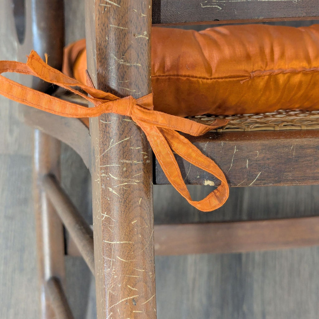 Vintage Bentwood  Rocking Chair with Cane Back and Orange Cushion