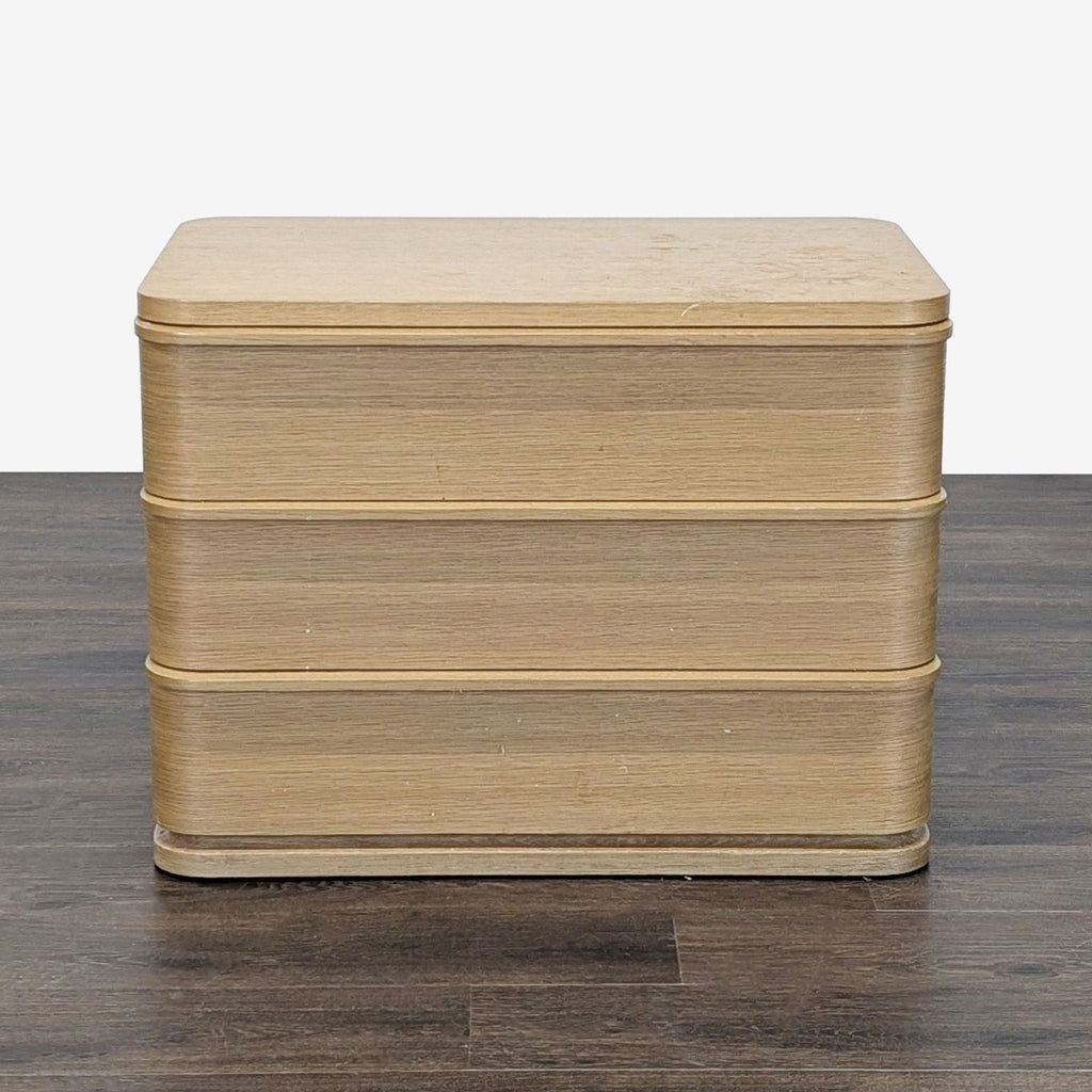 American white oak end table from Restoration Hardware, designed by Julie Lawrence, with a modern silhouette.