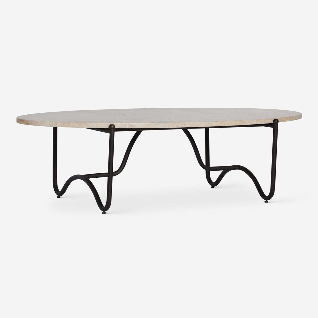Modern table featuring a smooth stone surface and sturdy black legs from Lulu and Georgia.  