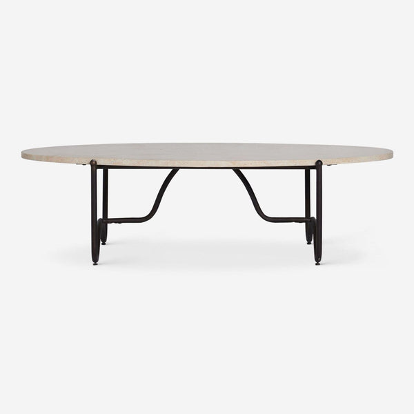 Round Lulu and Georgia coffee table with a travertine top and black metal curved base.  