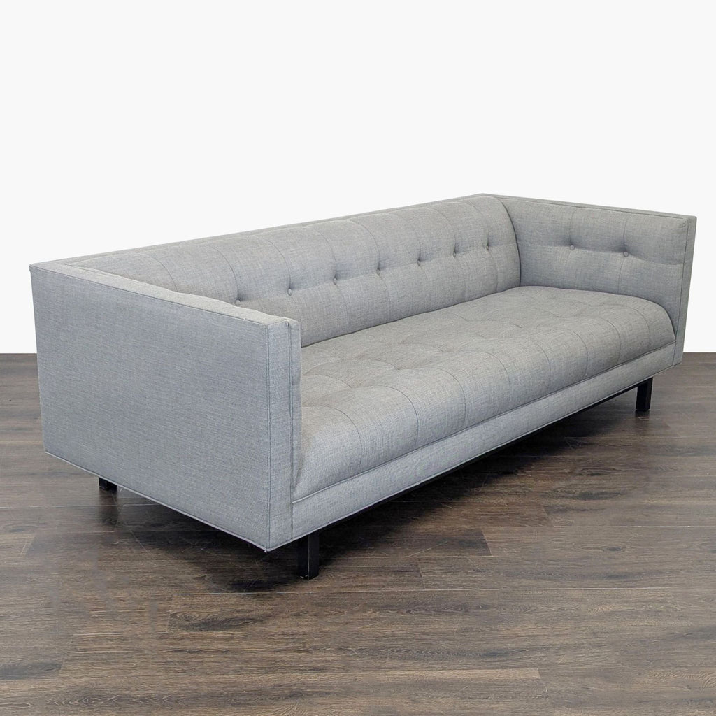 Contemporary light gray 3-seat sofa by Restoration Hardware with tufted back, perfect for living rooms or offices.