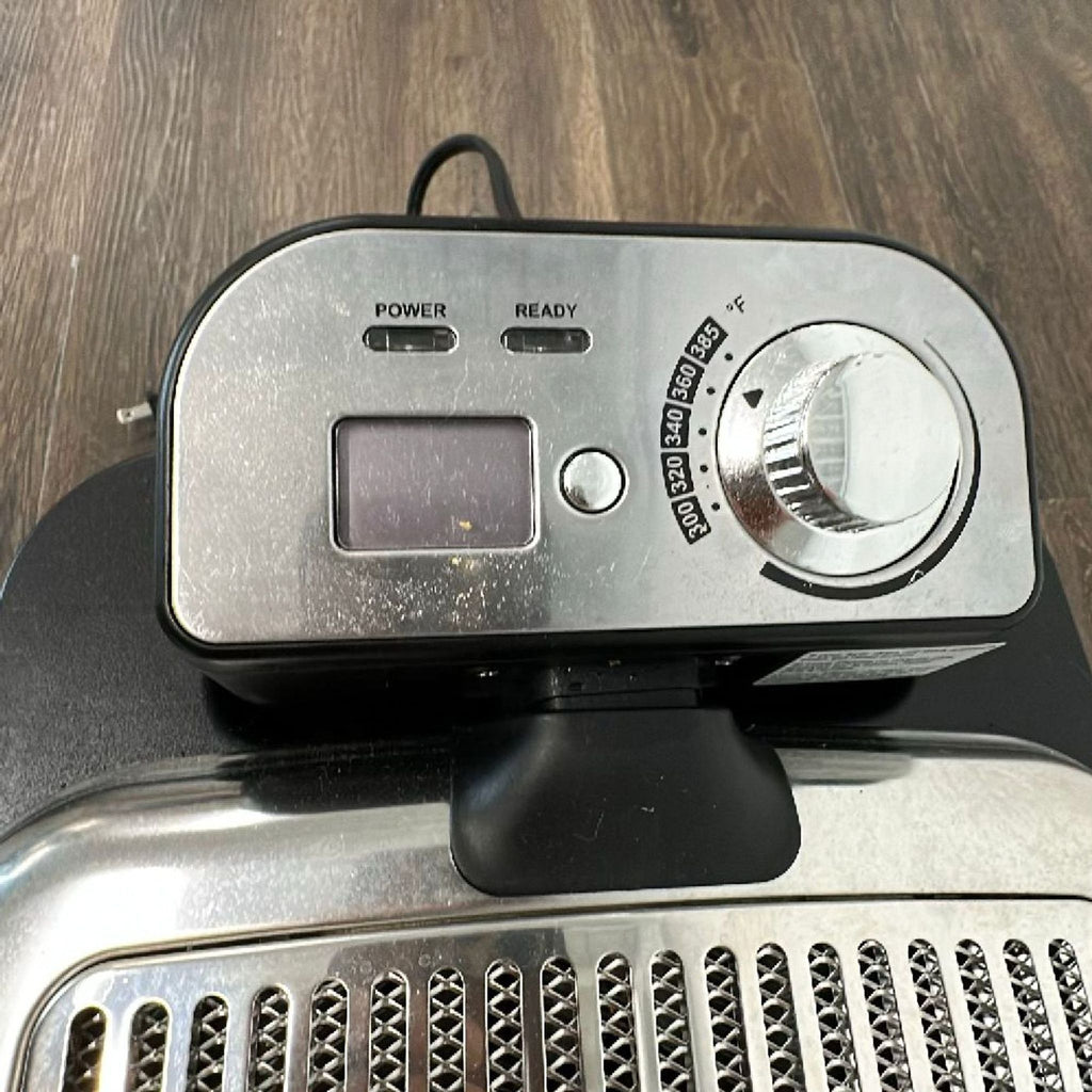All-Clad deep fryer in stainless steel, showing durable build, digital controls, and sturdy handles for home use.