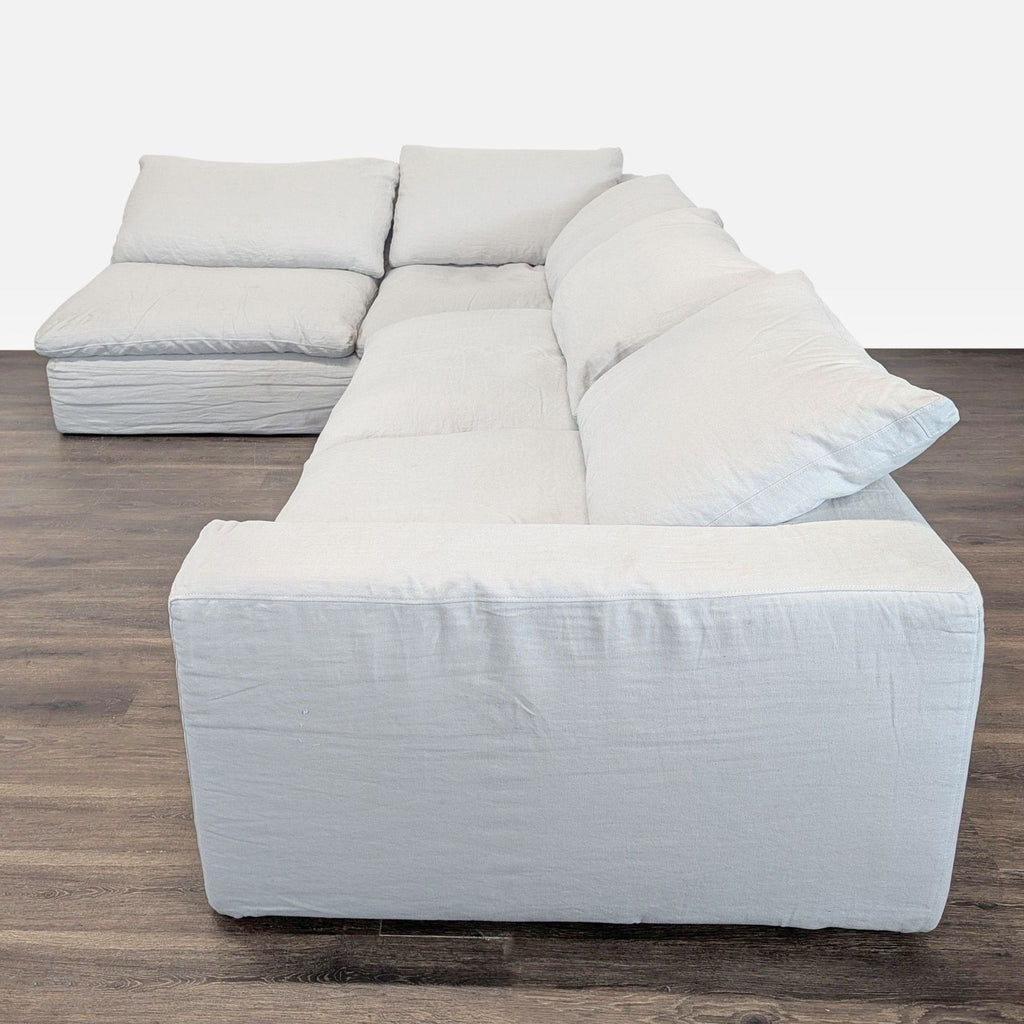 Modern Restoration Hardware sectional with clean lines, durable materials, and comfortable, spacious seating.