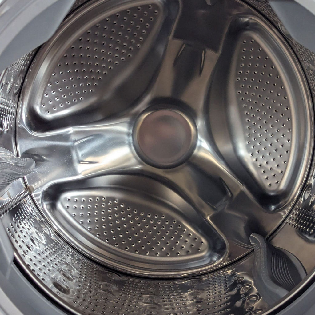 3. LG washer/dryer unit in silver, featuring user-friendly controls and compact design, ideal for efficient laundry.