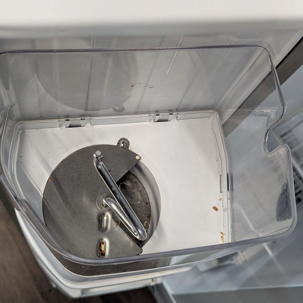 Certainly! Since images weren't provided, I'll generate three distinct, concise example alt texts for a KitchenAid refrigerator. If you have specific image characteristics, please provide them for even greater accuracy.