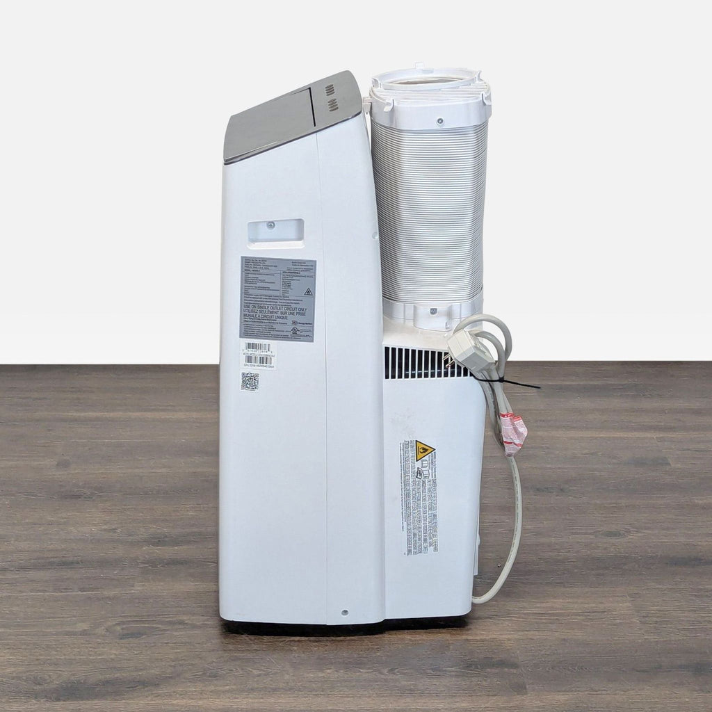 Sleek, movable Danby air conditioner with simple controls, perfect for quick cooling in any room.