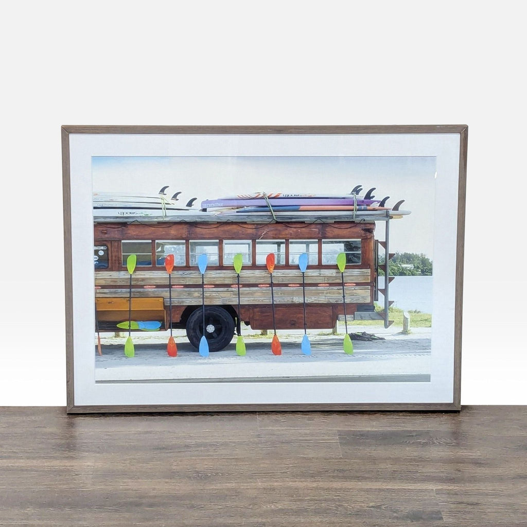 Framed art print of a wooden surf bus carrying surfboards and paddles, perfect for adding beach vibes.