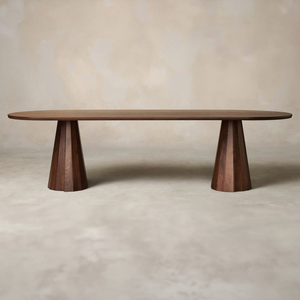 1. Maiden Home Bank Dining Table with a beveled-edge top and faceted conical base, handcrafted in New York.  