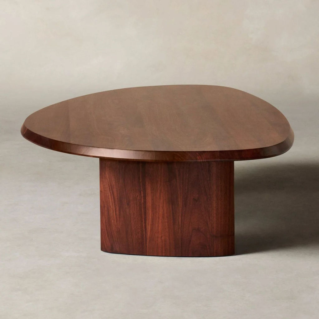 3. Close-up front view of Maiden Home coffee table highlighting its curved edges and sturdy wood construction.