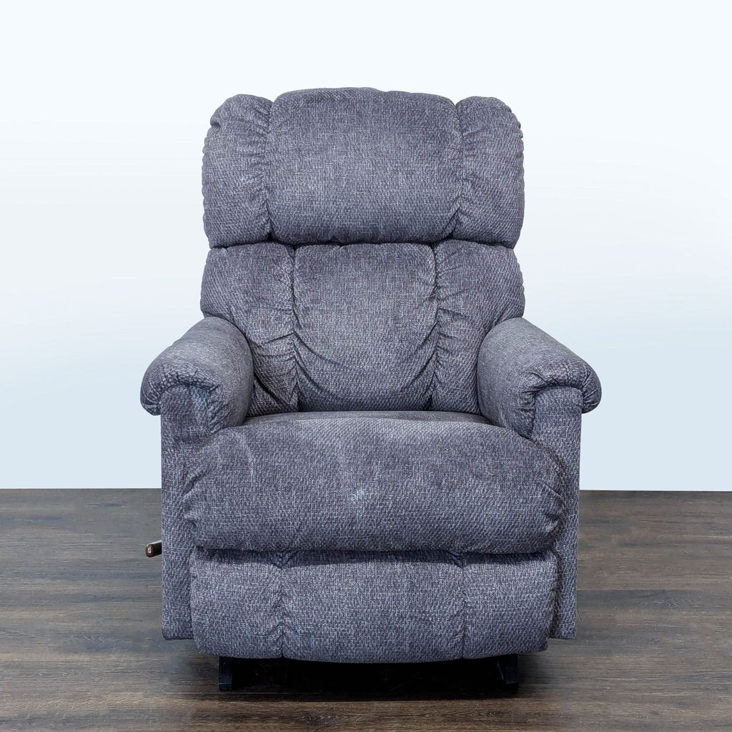 La-Z-Boy lounge chair with plush padding, soft fabric, and manual recline, ideal for relaxing at home.