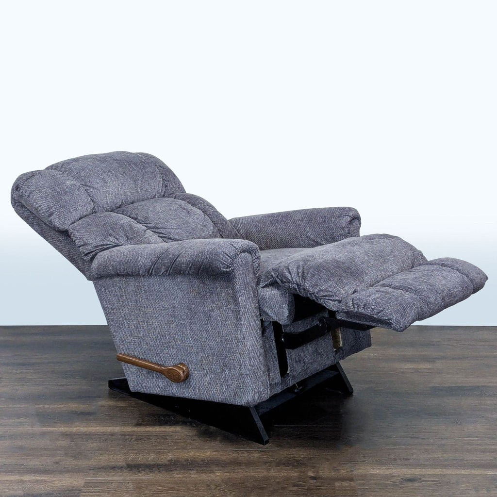 Comfortable La-Z-Boy recliner chair in the Lounge category, featuring cushioned support and extendable footrest.