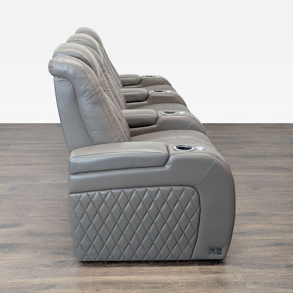 Seatcraft Muse 3-seat power recliner sofa in gray leather, featuring adjustable headrest and lumbar support.