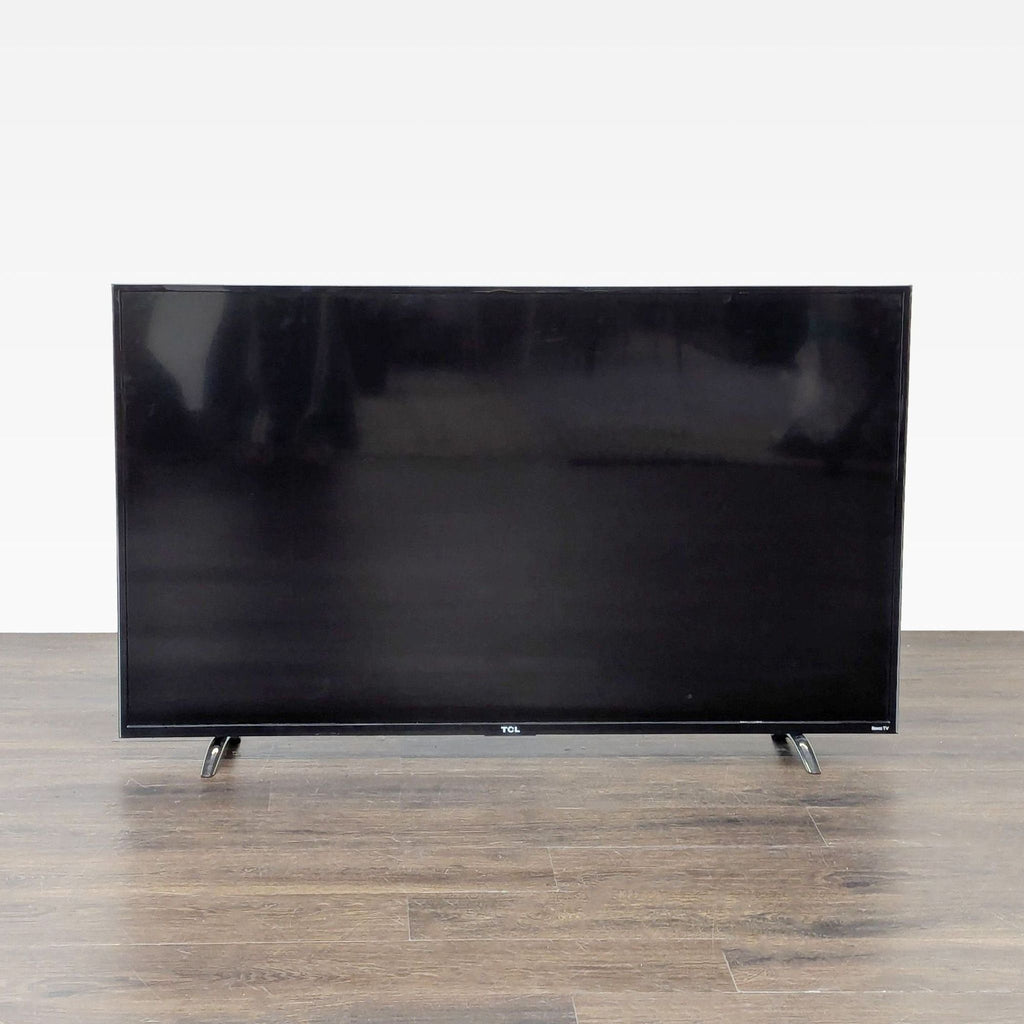 TCL 43-inch Roku Smart TV in excellent condition, offering streaming apps and multiple HDMI ports.
