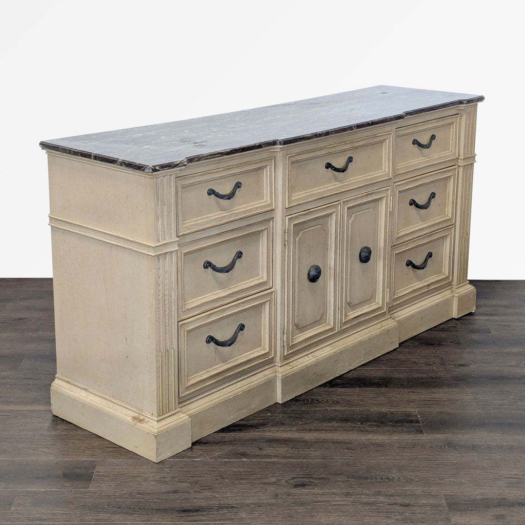 3. Nine-drawer Stanley dresser with a marble surface, providing elegant storage for bedrooms or living spaces.