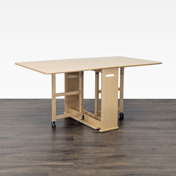 Greenington dining table with liftable leaves and extendable gateleg for full-size expansion.