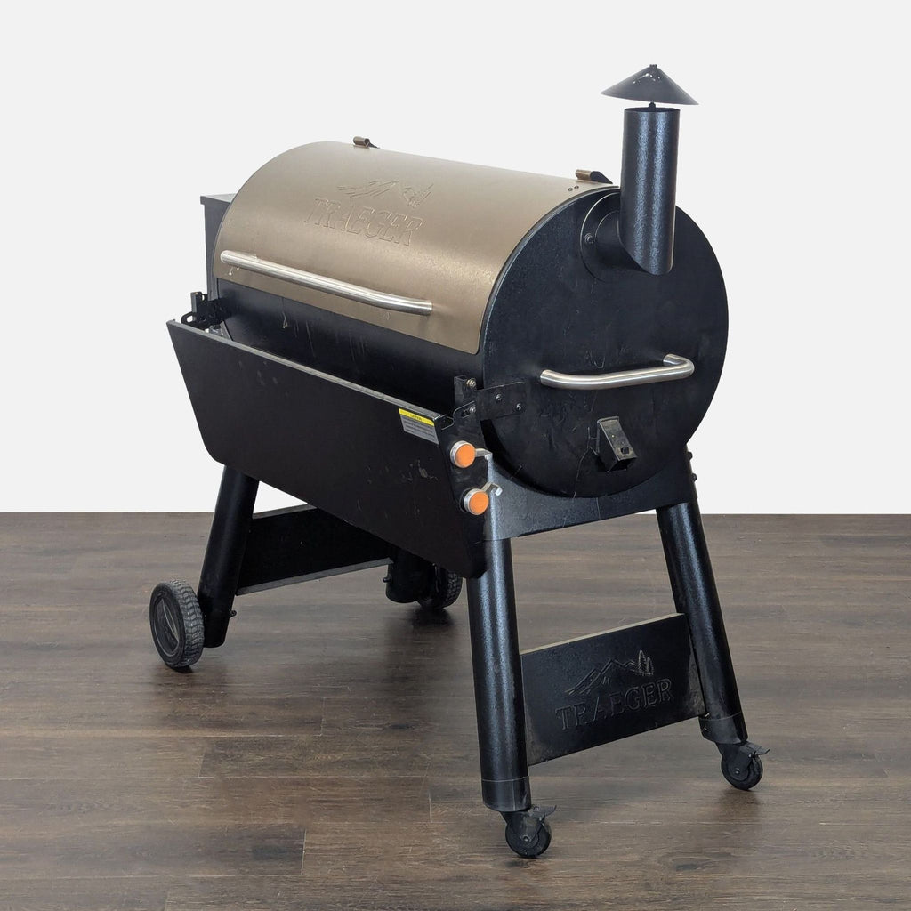Traeger grill for grilling and smoking, featuring a durable design, mobility wheels, and a secure lidded top.