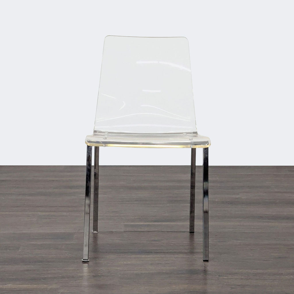 1. Clear acrylic dining chair with sleek metal legs shown from the front on a dark wood floor.