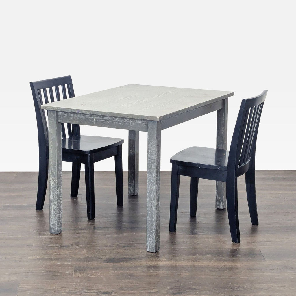 Pottery Barn Kids solid wood Carolina table in neutral gray, classic slats, sturdy, ideal for play or homework.