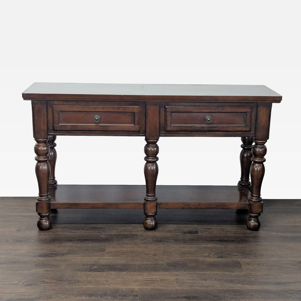 1. Classic two-drawer side table with turned legs, suitable for use as a console or accent table.