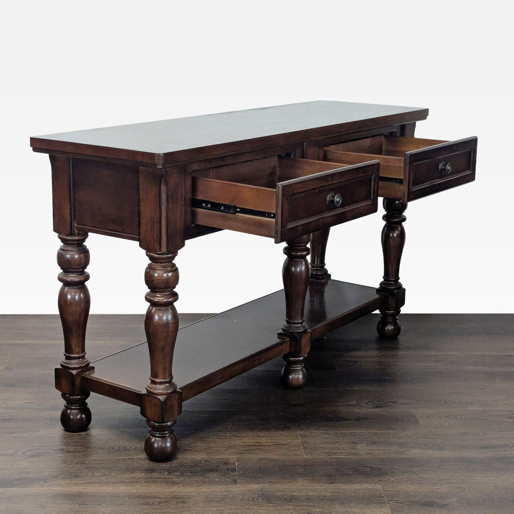 2. Wooden console table featuring two drawers and decorative turned legs, ideal for entryways or living rooms.