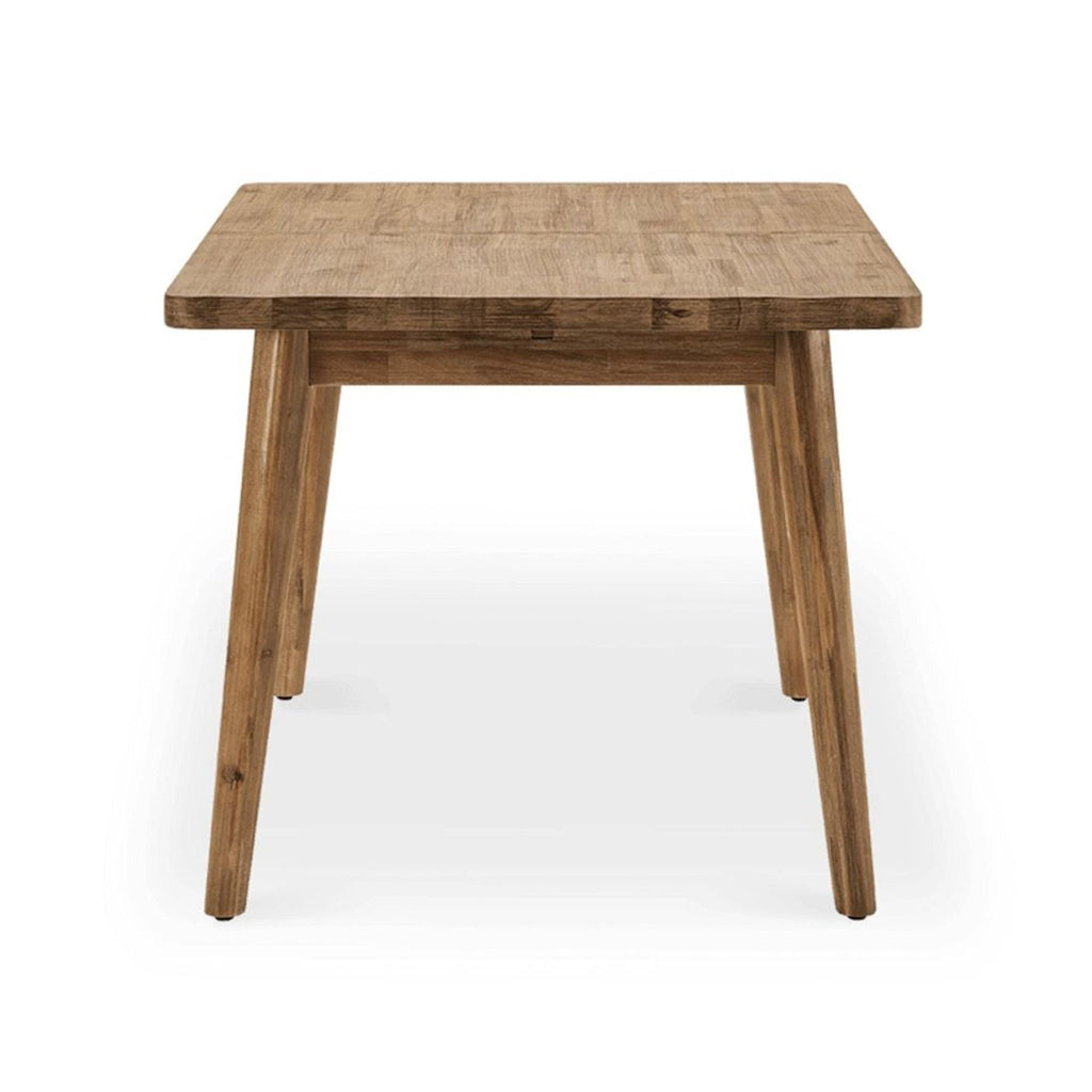 Solid acacia wood dining table with distressed finish, split tabletop, and extendable butterfly leaf design.