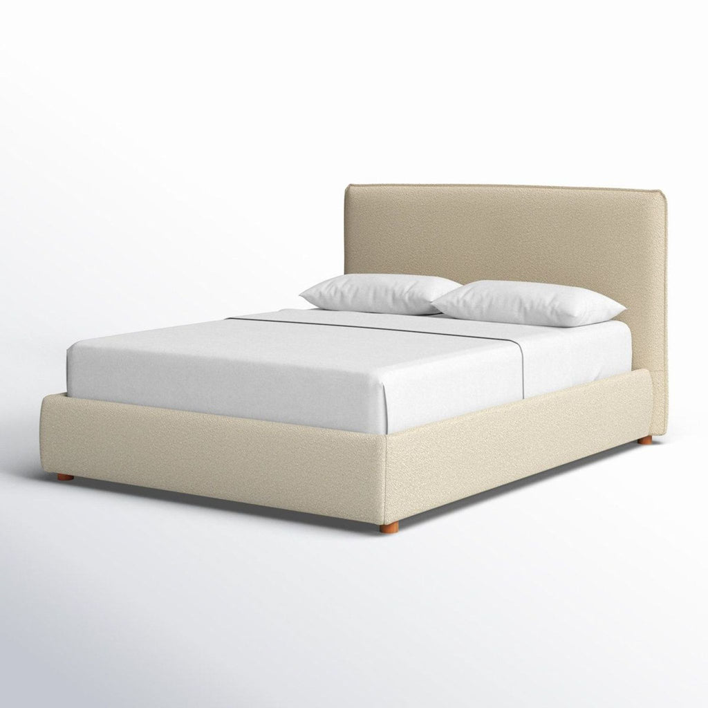 Cozy Birch Lane bed frame in soft beige fabric, featuring a simple padded headboard and sturdy wood support.