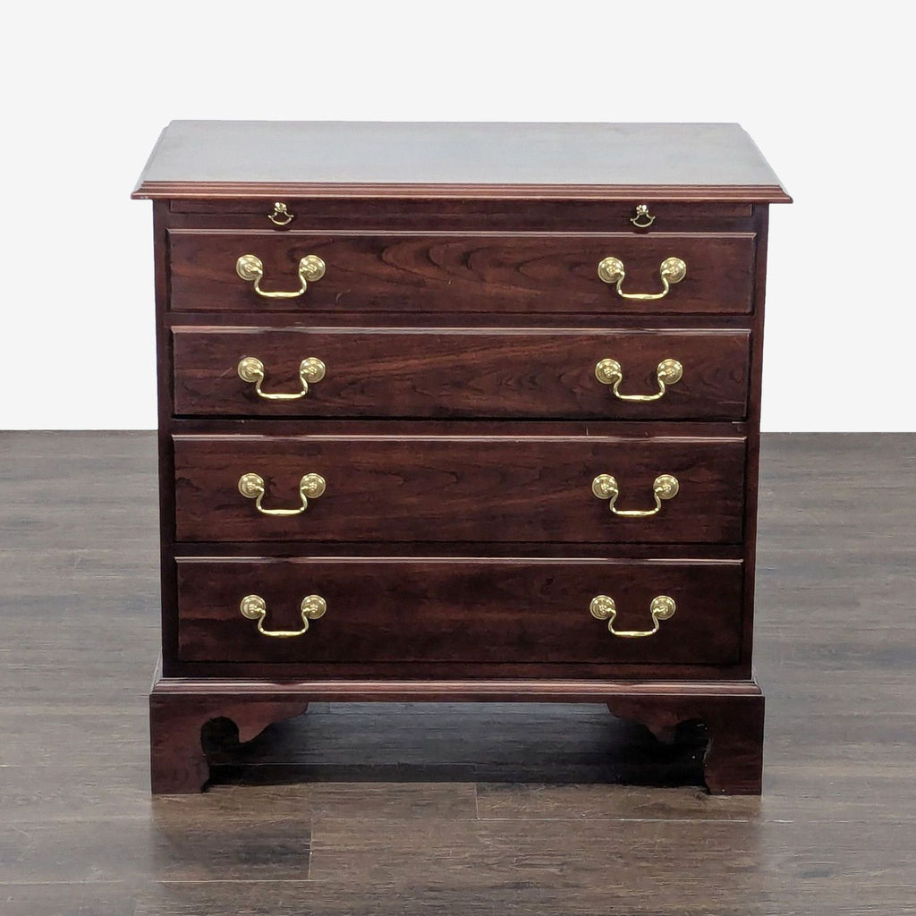 Stickley Chippendale-style bachelor's chest end table with brass accents, classic design.